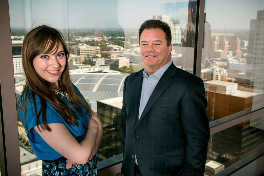 SEPTEMBER 15, 2017 SACRAMENTO, CA Barry Broome and Cynthia Carrillo pose in a building where their offices are, overlooking downtown and the Golden 1 Center, the sports and entertainment arena in downtown. Broome runs Greater Sacramento Economic Council and Carrillo is involved in recruiting tech companies from Silicon Valley. (David Butow / For The Times)