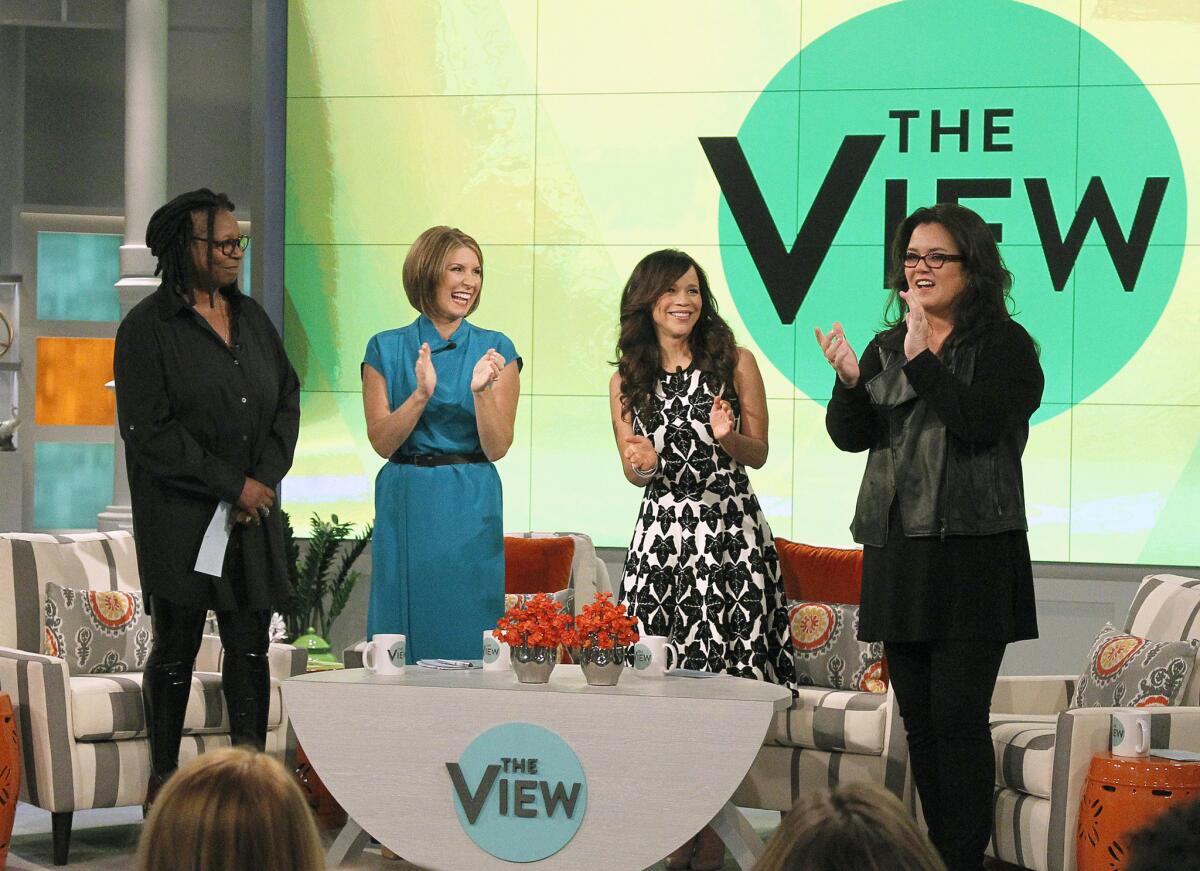 Whoopi Goldberg, Nicolle Wallace, Rosie Perez and Rosie O'Donnell appear on the set of "The View" on Sept. 15.