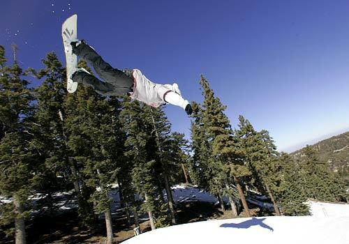 Air time: A snowboarder takes flight over a jump at Mountain High in Wrightwood.