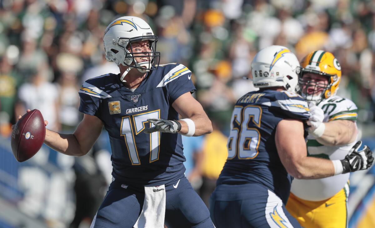 Chargers quarterback Philip Rivers passes against the Packers.