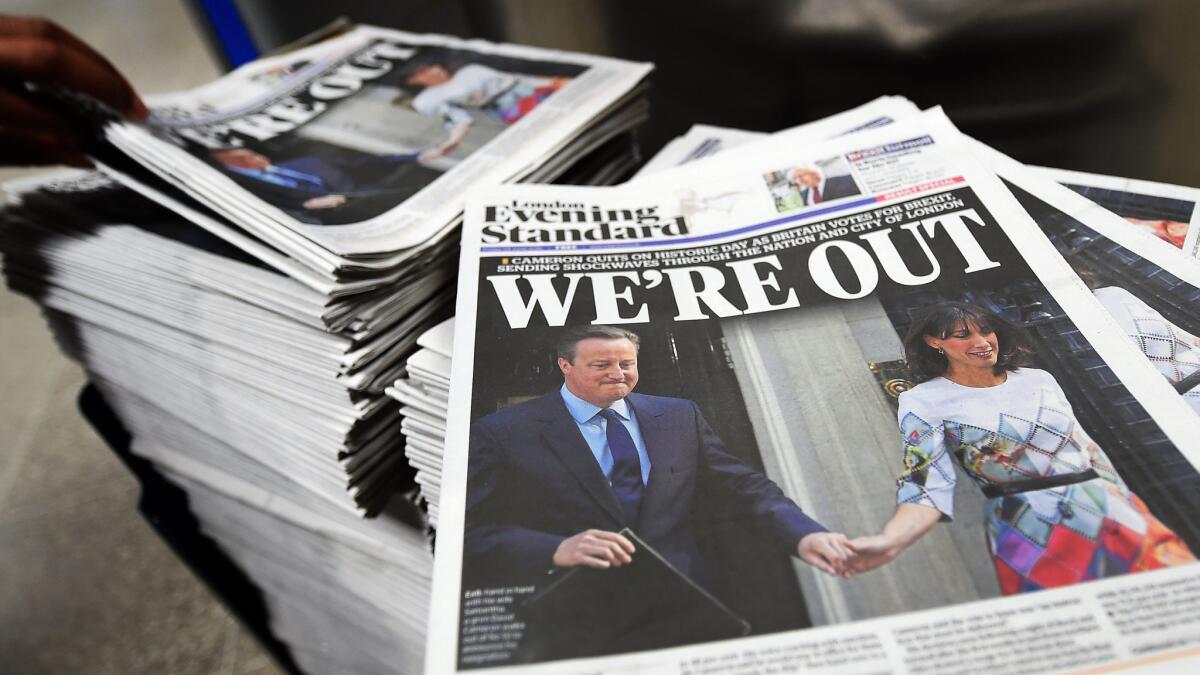 Copies of the Evening Standard announce the results of the "Brexit" referendum in London.