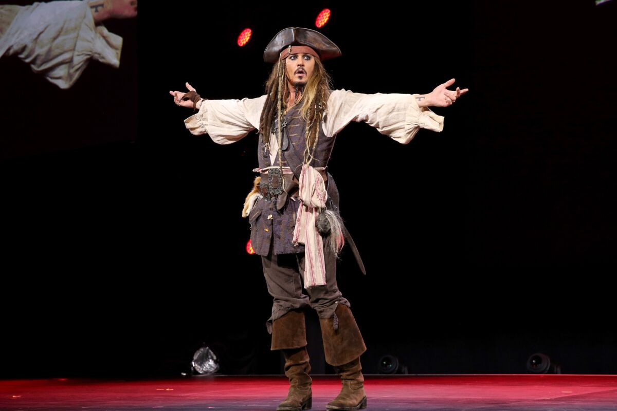 Johnny Depp, dressed as Capt. Jack Sparrow, took the stage Saturday at Disney's D23 Expo in Anaheim.