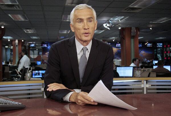 Univision newscaster Jorge Ramos works in the studio in Miami.