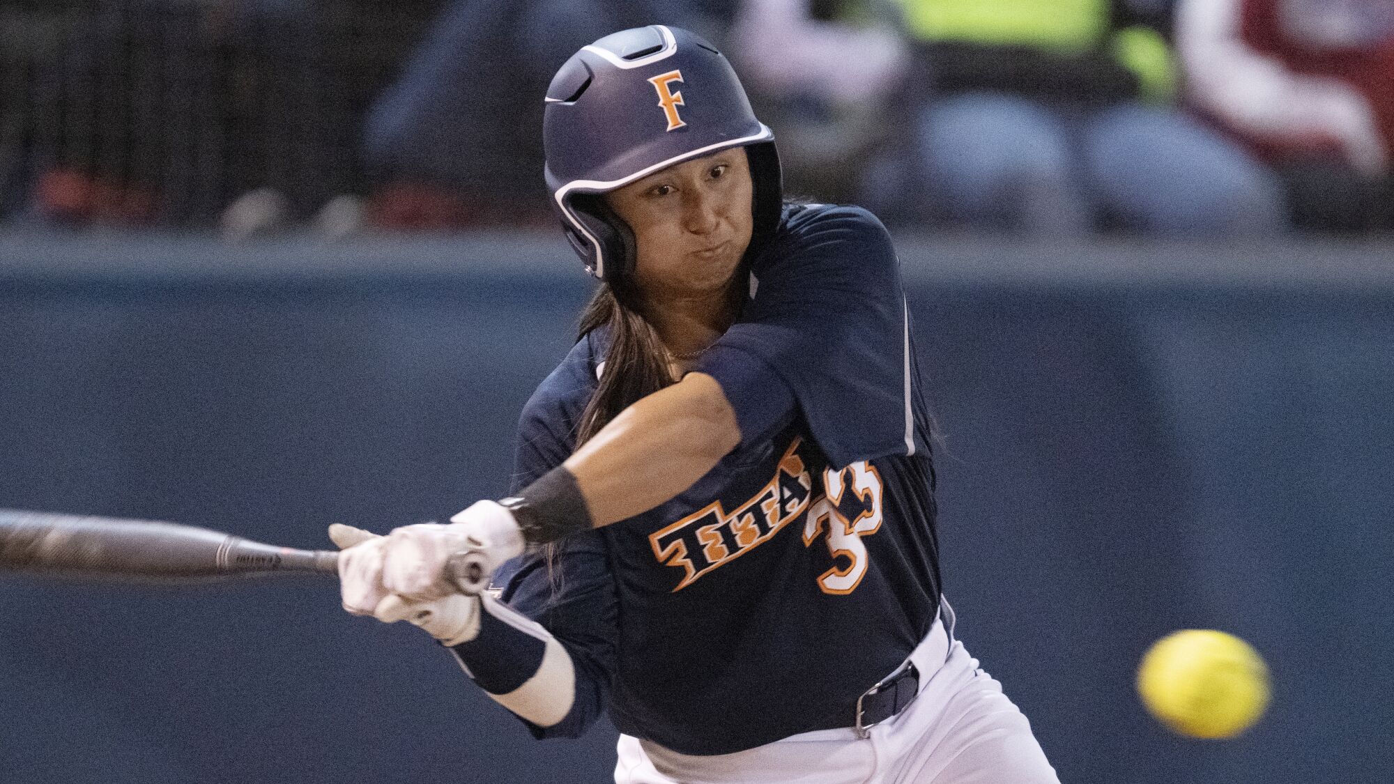 Cal State Fullerton's Kelsie Whitmore bats during a 2020 softball game
