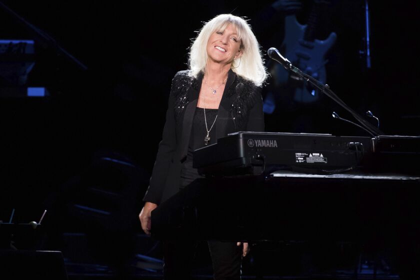 FILE - Christine McVie from the band Fleetwood Mac performs at Madison Square Garden in New York on Oct. 6, 2014. McVie, the soulful British musician who sang lead on many of Fleetwood Mac’s biggest hits, has died at 79. The band announced her death on social media Wednesday,. (Photo by Charles Sykes/Invision/AP, File)