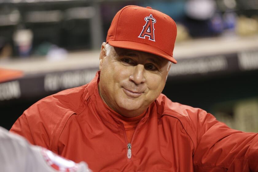 Angels Manager Mike Scioscia says the bad blood between him and Kansas City Manager Ned Yost is a thing of the past.