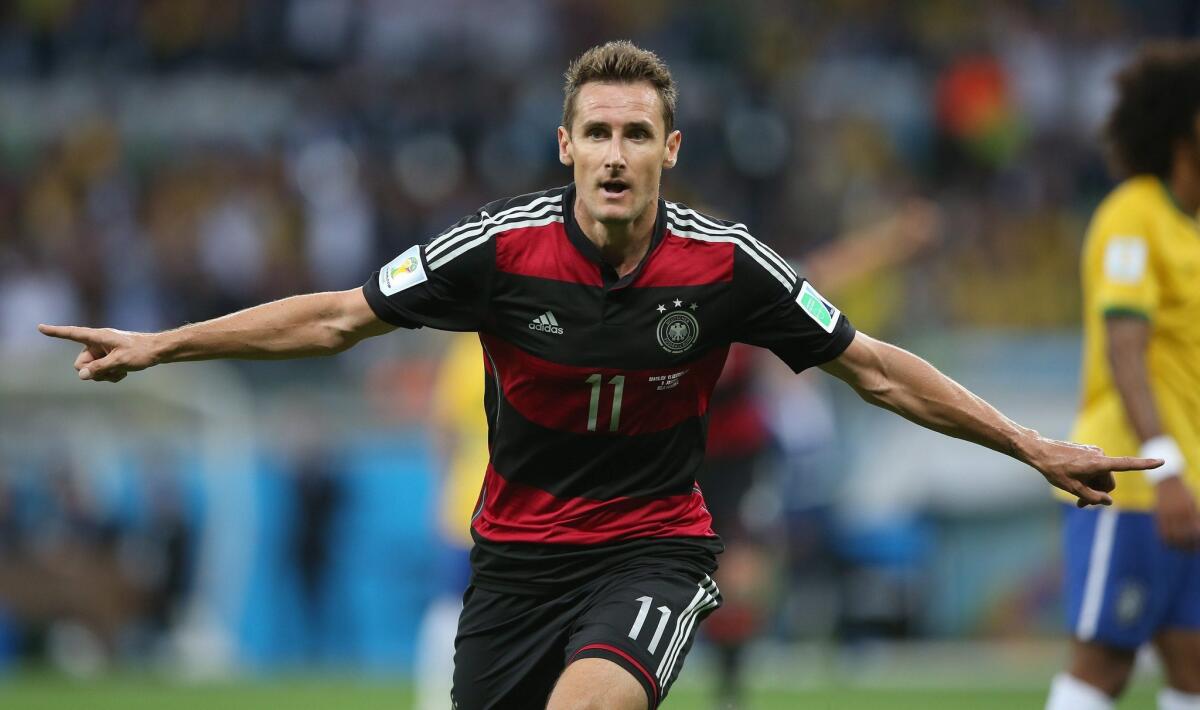 Miroslav Klose of Germany celebrates after scoring.