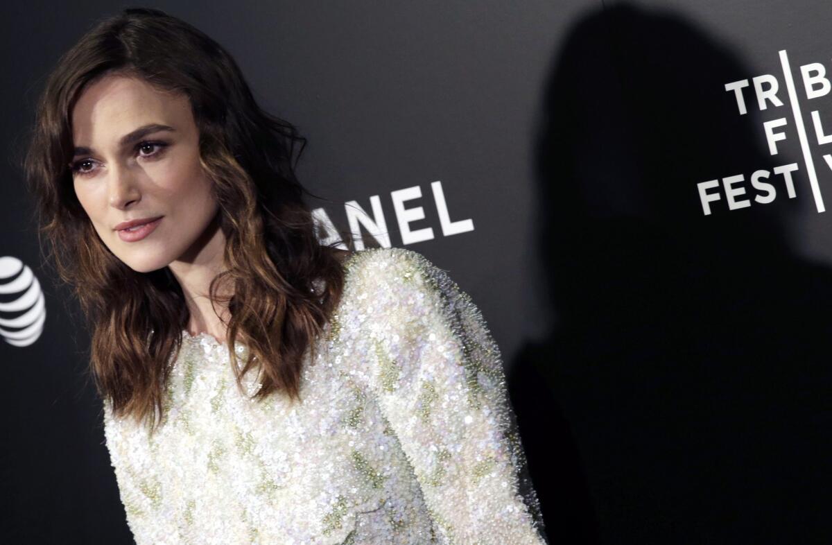 Keira Knightley in Chanel arrives at the U.S. premiere of "Begin Again" at the Tribeca Film Festival in New York.