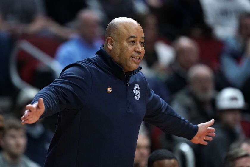 Penn State head coach Micah Shrewsberry directs his team in the first half of a second-round college basketball game against Texas in the NCAA Tournament, Saturday, March 18, 2023, in Des Moines, Iowa. (AP Photo/Charlie Neibergall)