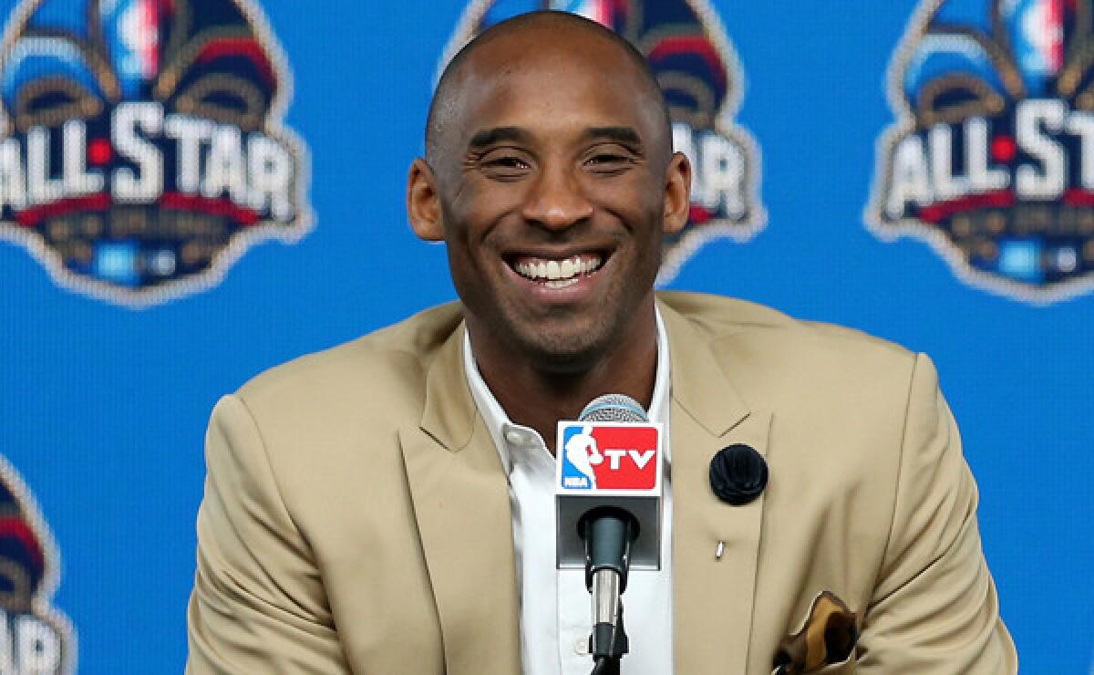 Lakers star Kobe Bryant smiles while answering questions during a news conference before Sunday's NBA All-Star Game in New Orleans. Bryant says he's optimistic about the Lakers once again becoming one of the league's elite teams.