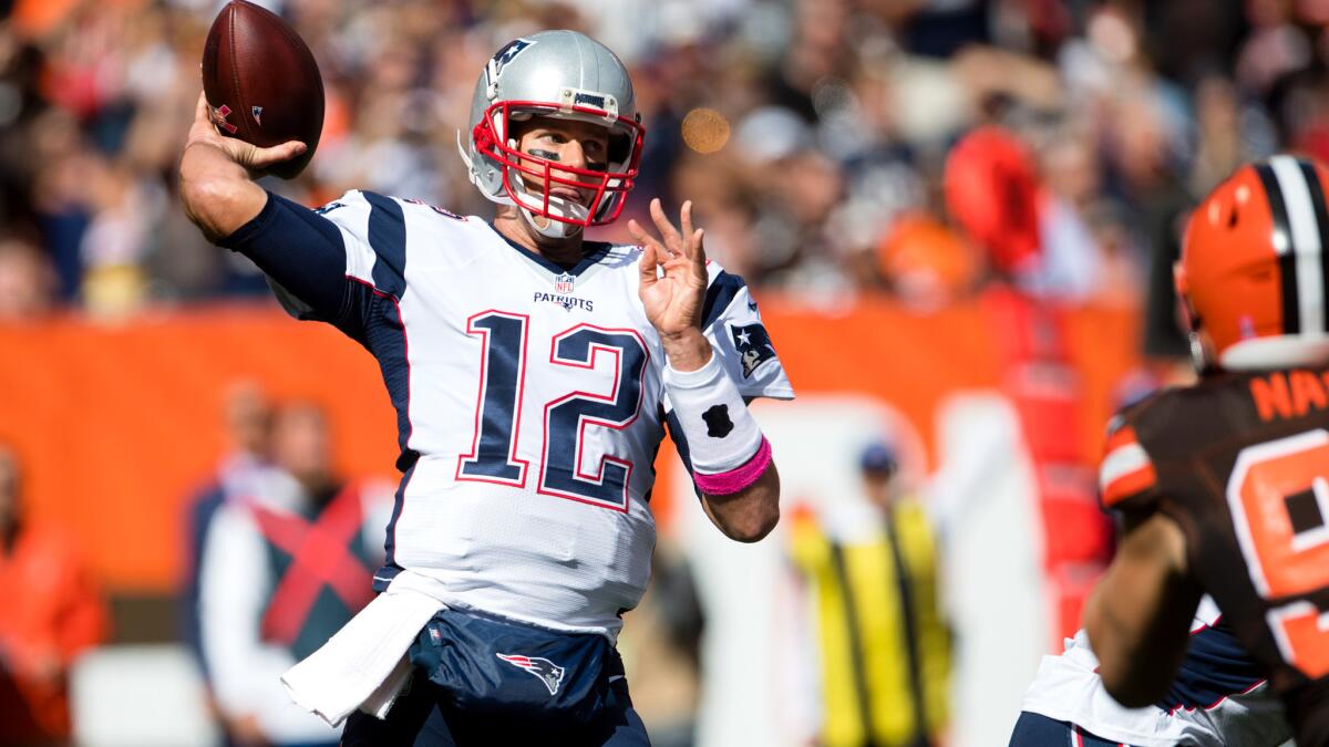 Patriots quarterback Tom Brady passed for more than 400 yards in his first game back from a suspension.