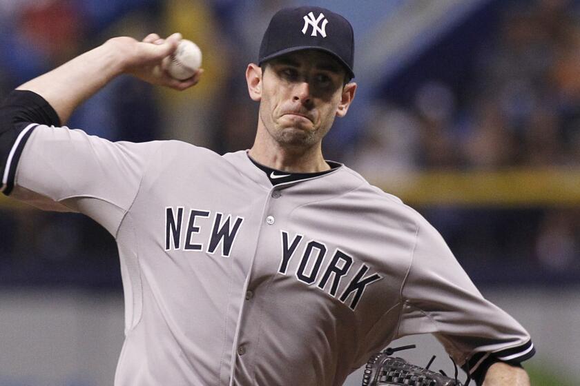 Brandon McCarthy, pitching for the New York Yankees, delivers during a game against the Tampa Bay Rays in September.