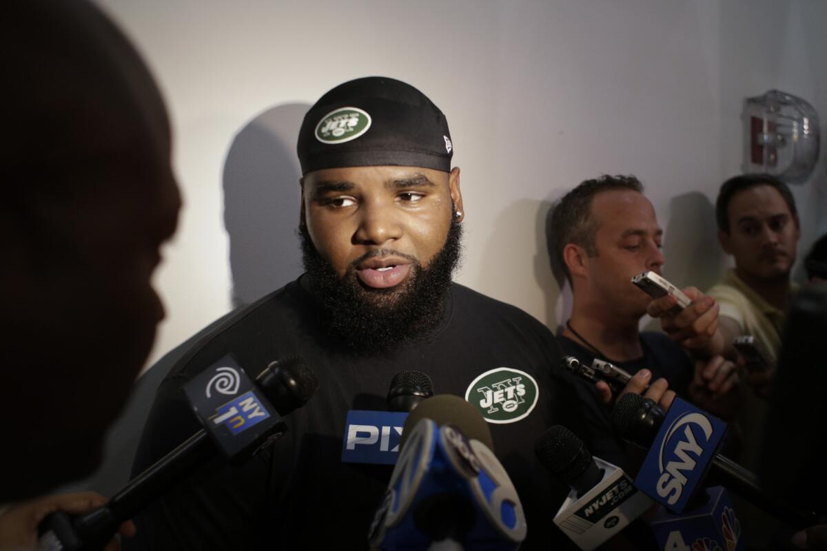 New York Jets defensive end Sheldon Richardson responds to questions during an interview Thursday at training camp.
