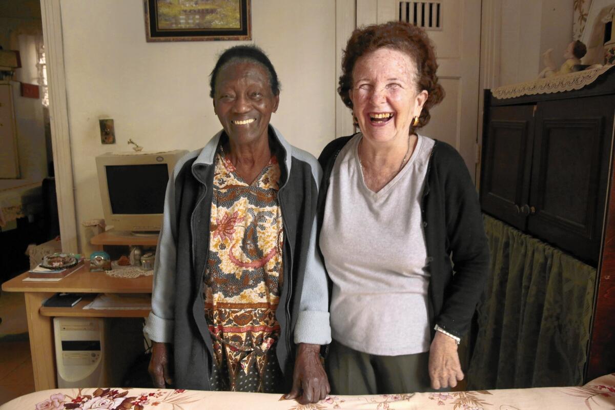 Magda Danger, 88, left, and Frida Zaitman, 61, at home in Havana. Danger was in her 20s when Zaitman’s widowed father hired her to take care of his daughter and two sons.