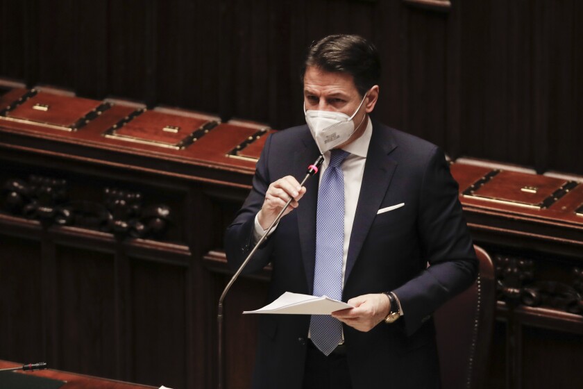 Premier Giuseppe Conte delivers his speech at the lower chamber of Parliament, in Rome, Monday, Jan. 18, 2021. Conte fights for his political life with an address aimed at shoring up support for his government, which has come under fire from former Premier Matteo Renzi's tiny but key Italia Viva (Italy Alive) party over plans to relaunch the pandemic-ravaged economy. (AP Photo/Alessandra Tarantino, pool)