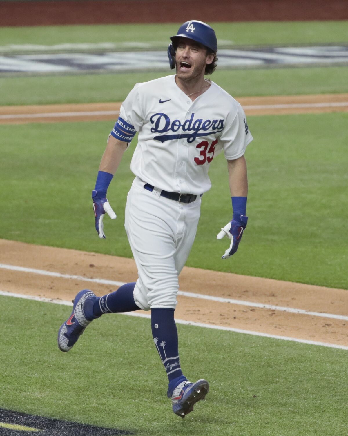 Dodgers center fielder Cody Bellinger celebrates after hitting a home run.