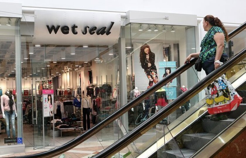 Wet Seal has agreed to pay $7.5 million to settle a racial discrimination lawsuit. Above, a Wet Seal store at the Westfield Fashion Square mall in Sherman Oaks.