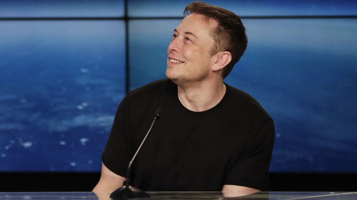 Elon Musk speaks at a news conference on Feb. 6.