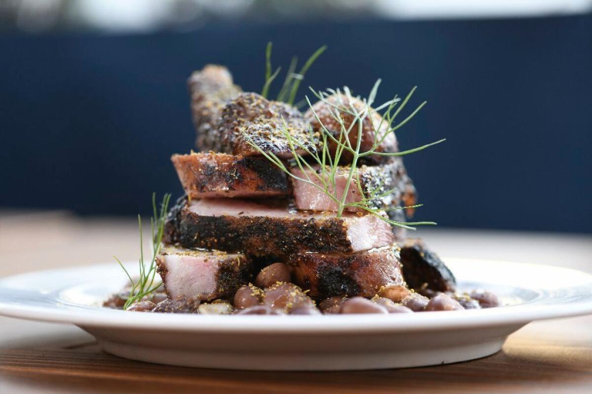Matt Molina combines pork rib with sausage and cranberry beans as a play on mixed grills.