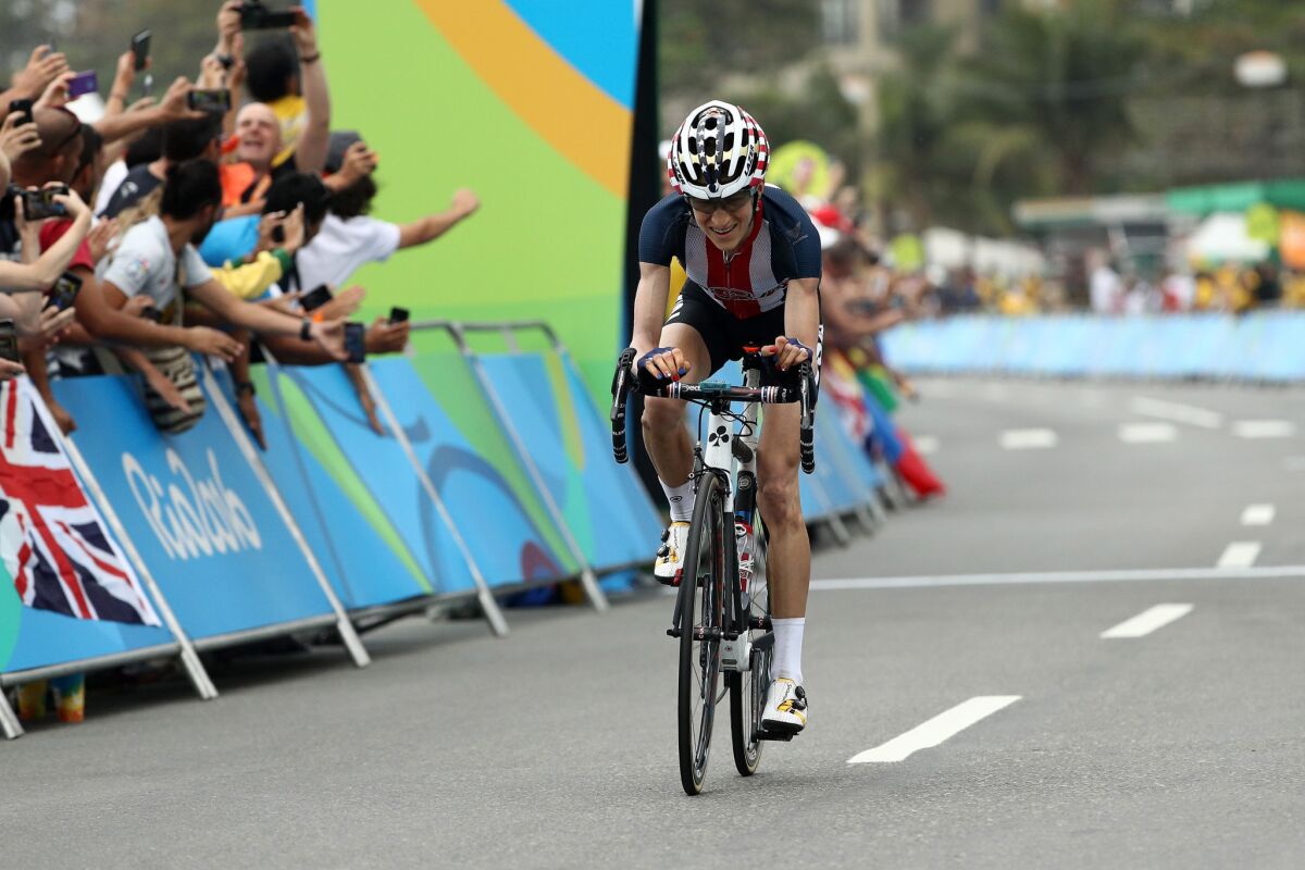 U.S. cyclist Mara Abbott crosses the finish line in fourth place in the women's road race at the Rio Olympic Games on Aug. 7.