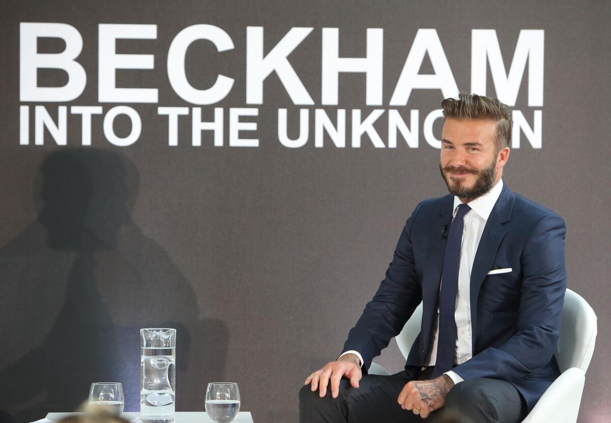 Will David Beckham return to the MLS? He is shown during a news event for the documentary "David Beckham: Into the Unknown."