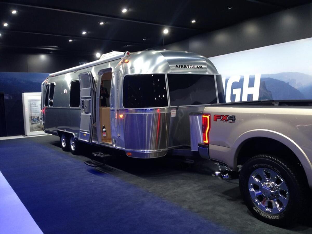 The signature, polished-aluminum capsule of an Airstream trailer at the L.A. Auto Show. Sales are "up 18% year to date over last year,” the company's chief executive says.