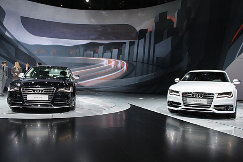 Audi shows off its 2013 S8, left, and S7.