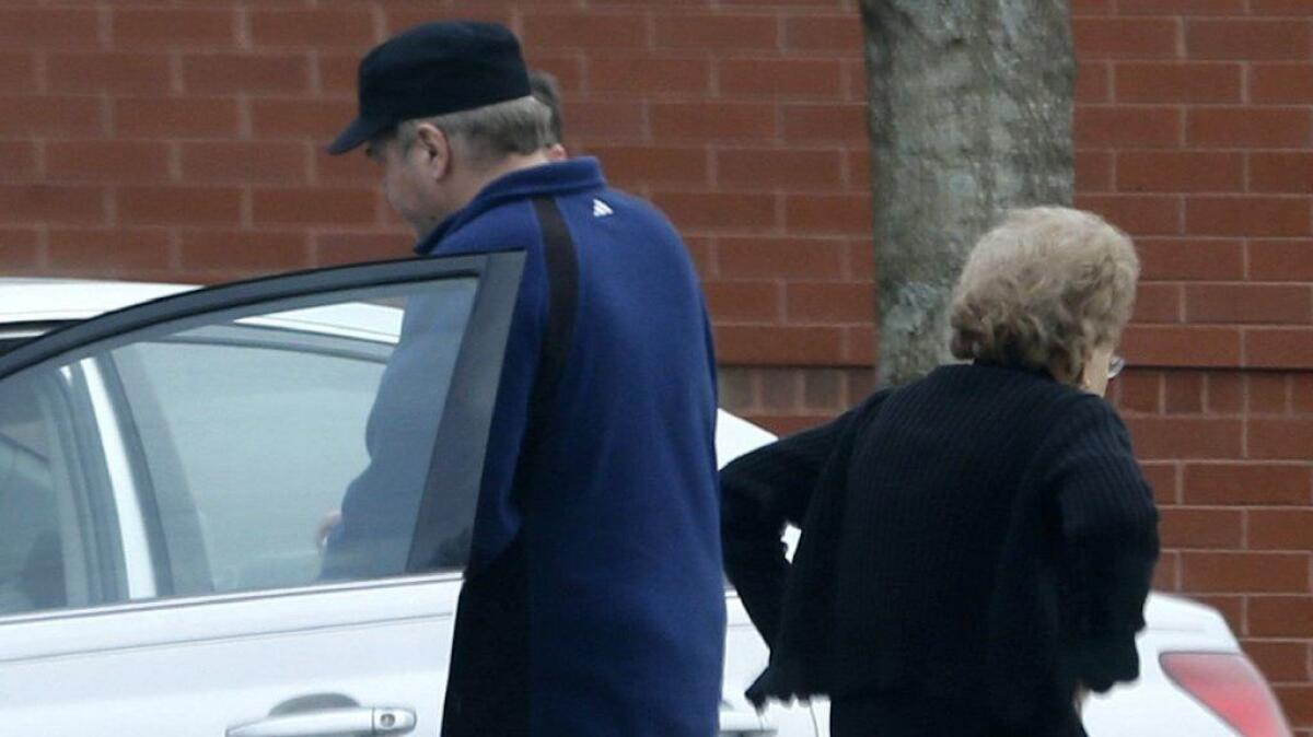 John Hinckley gets into his mother's car in front of a recreation center in Williamsburg, Va., on March 19, 2015.