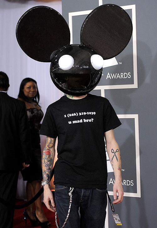 For the Record: Deadmau5 was earlier identified in this photo as Danger Mouse. Multiple-award nominee, including as a producer in the remixed recording, non-classical category and dance album, Deadmau5.