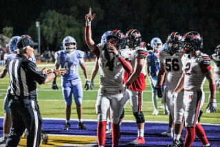 Matix Frithsmith celebrates after his third touchdown run in Hart's 34-17 win over Saugus.