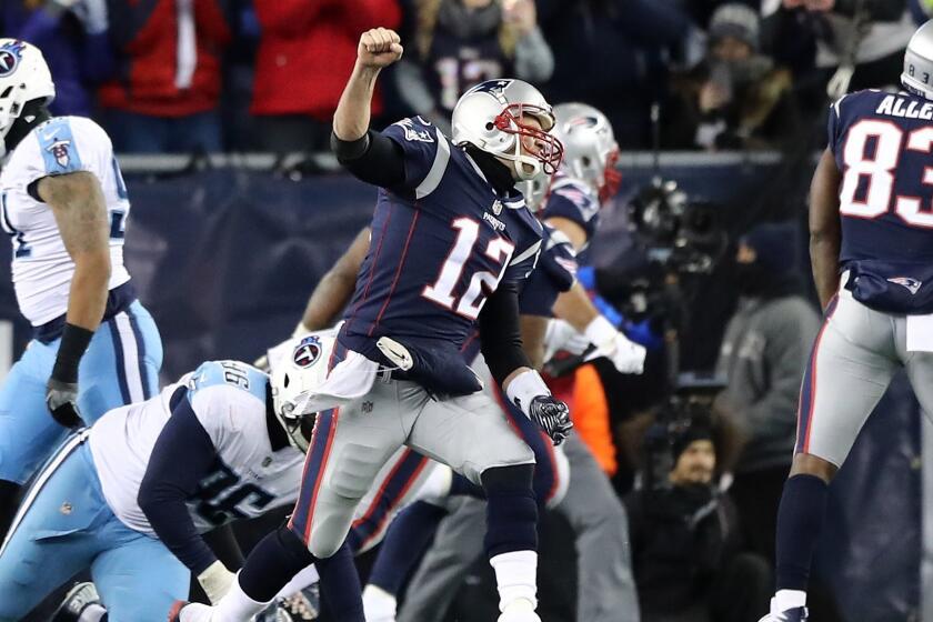 FOXBOROUGH, MA - JANUARY 13: Tom Brady #12 of the New England Patriots reacts after a touchdown in the third quarter of the AFC Divisional Playoff game against the Tennessee Titans at Gillette Stadium on January 13, 2018 in Foxborough, Massachusetts. (Photo by Elsa/Getty Images) ** OUTS - ELSENT, FPG, CM - OUTS * NM, PH, VA if sourced by CT, LA or MoD **