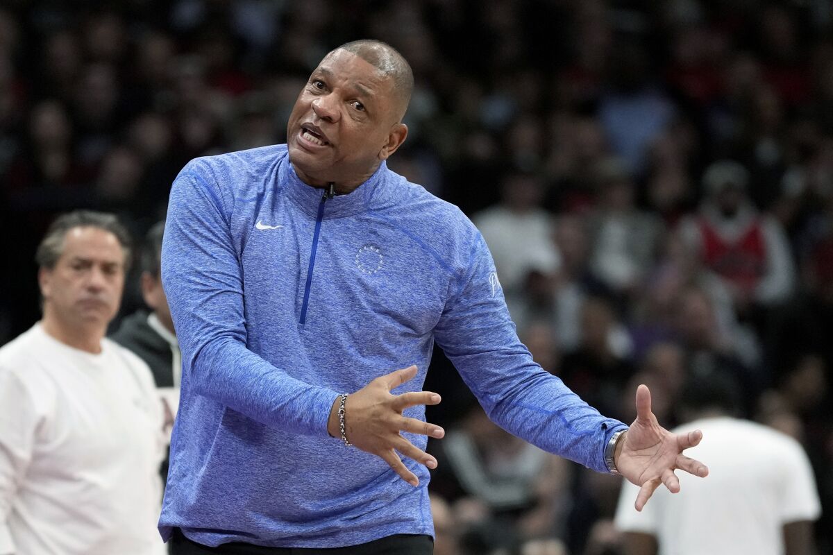Philadelphia 76ers coach Doc Rivers argues with officials during the second half of Game 6 of the team's NBA basketball first-round playoff series against the Toronto Raptors on Thursday, April 28, 2022, in Toronto. (Frank Gunn/The Canadian Press via AP)