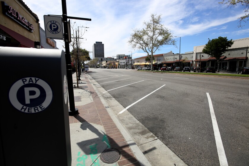 Brand Blvd. was eerily empty at noon, at a time when it usually is very busy, due to the novel coronavirus COVID 19 restrictions, in Glendale on Wednesday, March 18, 2020. Restaurants and other businesses remained opened but very little vehicles or foot traffic was found. Restaurants can only seel food for pick-up or delivery.