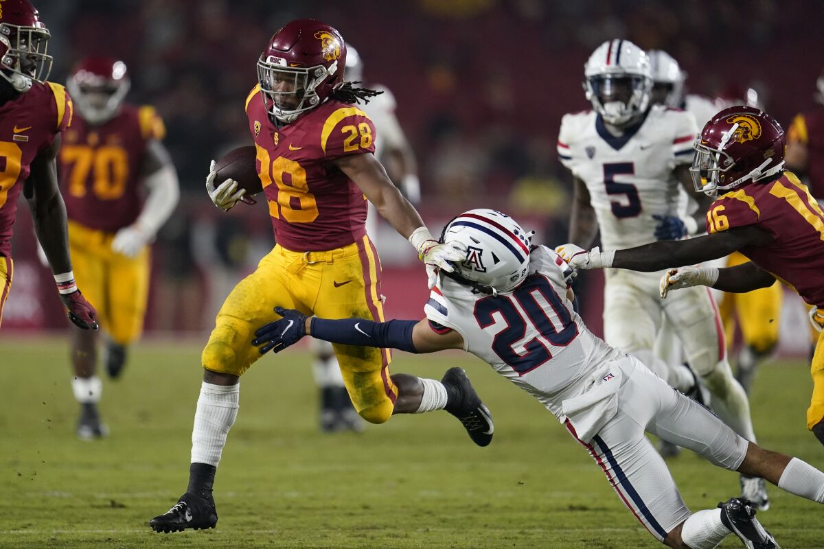 USC running back Keaontay Ingram runs with the ball against Arizona on Oct. 30 at the Coliseum.