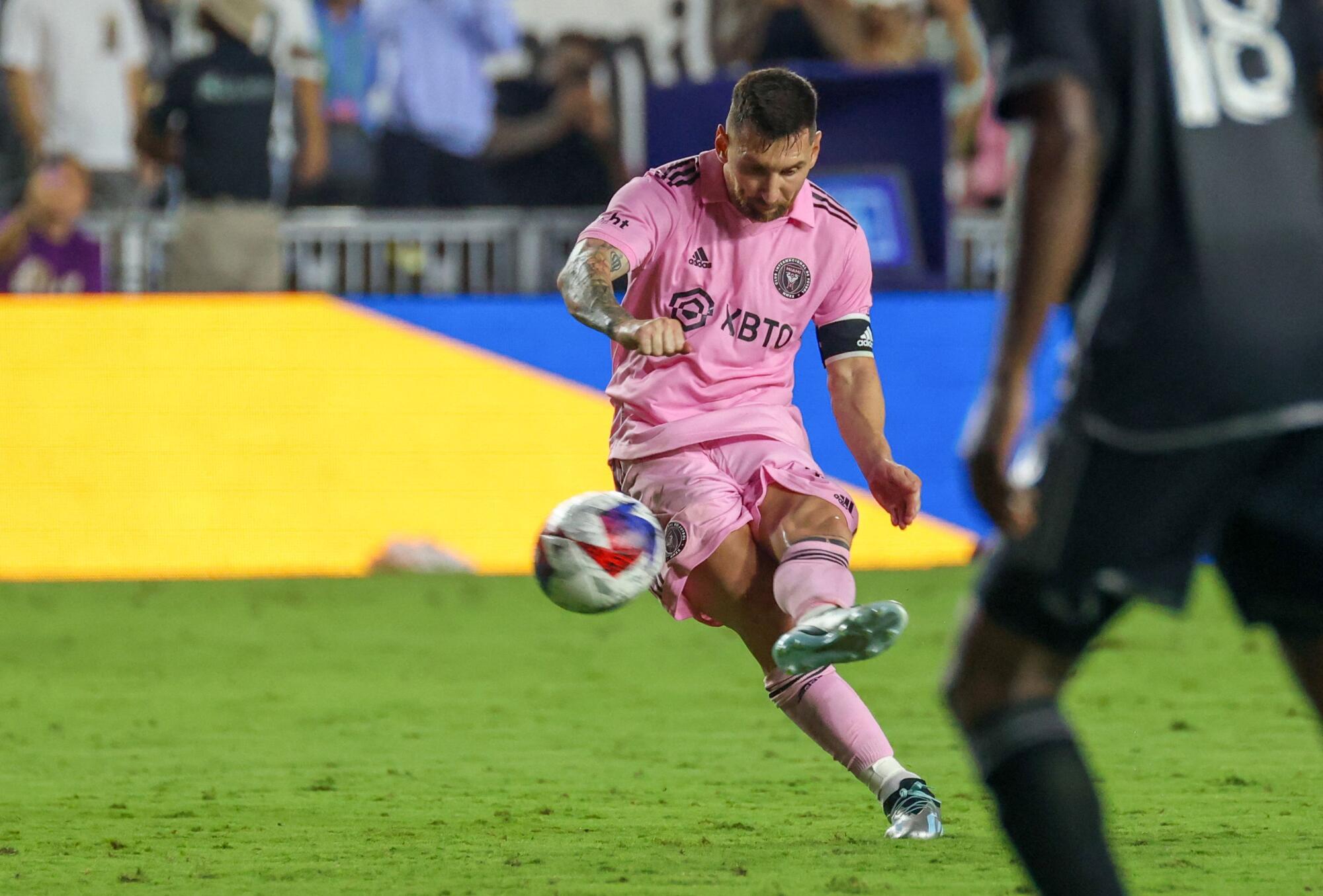Inter Miami's Lionel Messi executes a free kick during an MLS game.