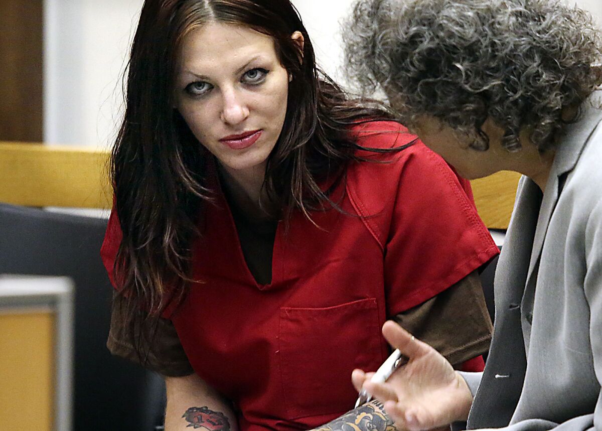 Alix Tichelman, left, confers with public defender Diane August during a court appearance in Santa Cruz Superior Court in July 2015.