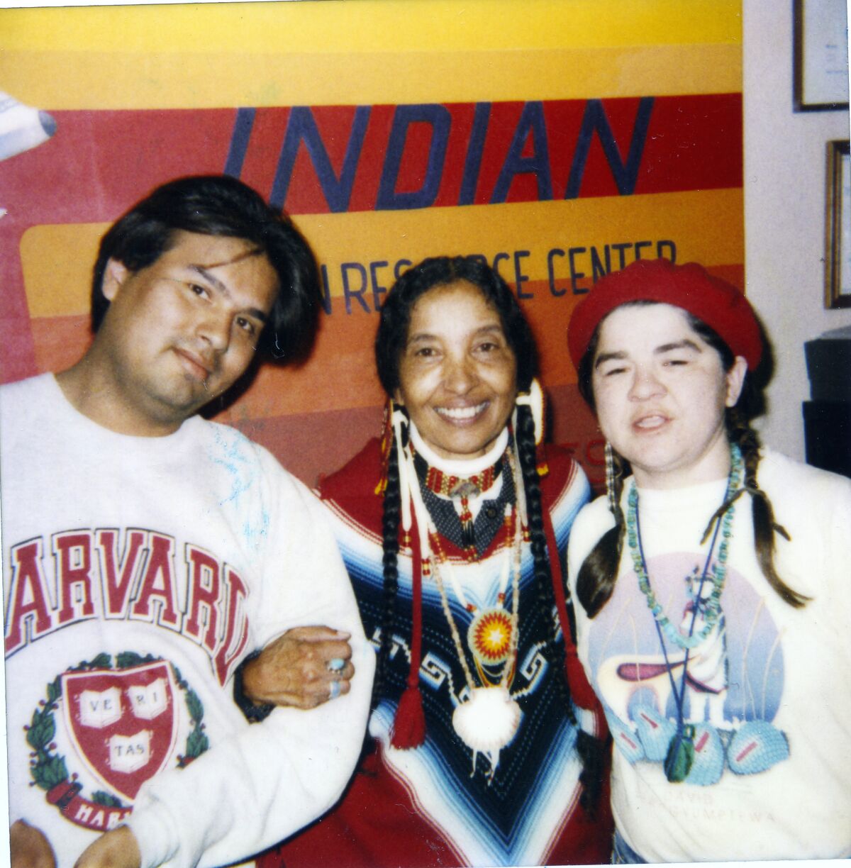 Karen Vigneault (far right), one of the founders of Nations of the Four Directions, with two unidentified people.