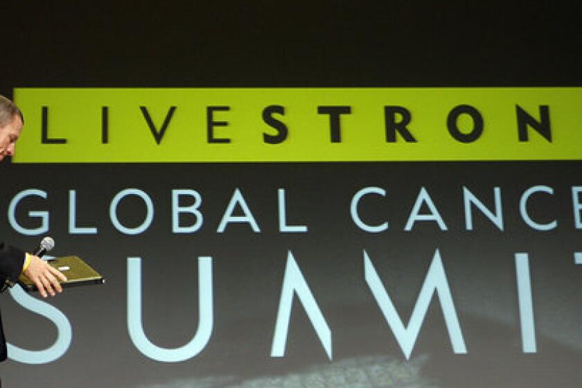 Lance Armstrong arrives to open the Livestrong Global Cancer Summit in Dublin, Ireland.