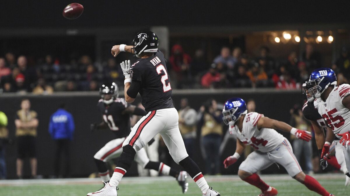 Atlanta Falcons quarterback Matt Ryan (2) works against the New York Giants during the second half.