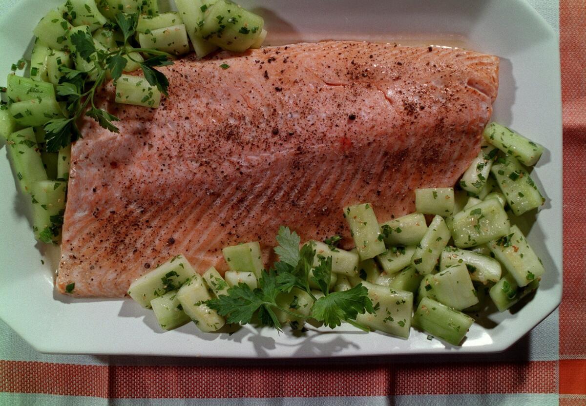 Oven-steamed salmon with cucumber salad.