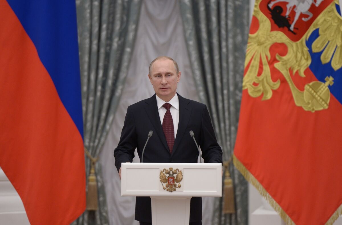 Russian President Vladimir Putin speaks during an awarding ceremony in Moscow's Kremlin.