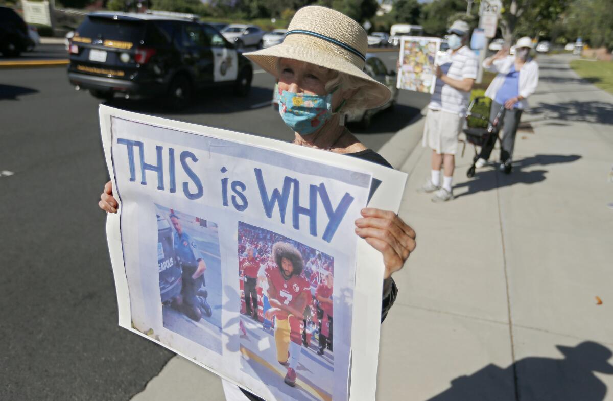 Janet Stangvick, 74, joins a protest in support of Black Lives Matter along El Toro Road in Laguna Woods