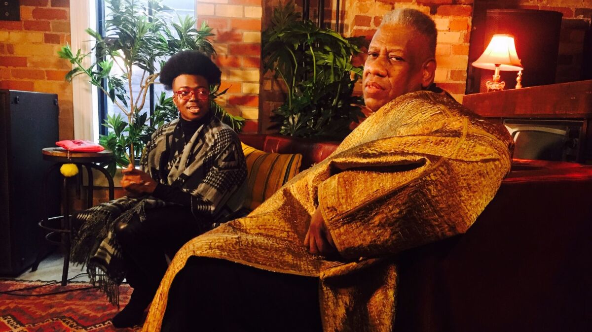 Los Angeles Times writer Tre'vell Anderson, left, speaks with fashion icon André Leon Talley.