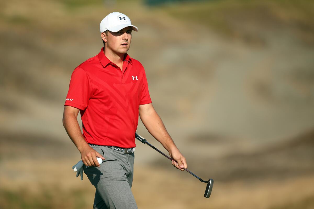 Jordan Spieth walks off the 14th green during the third round of the U.S. Open on Saturday at Chambers Bay in University Place, Wash.