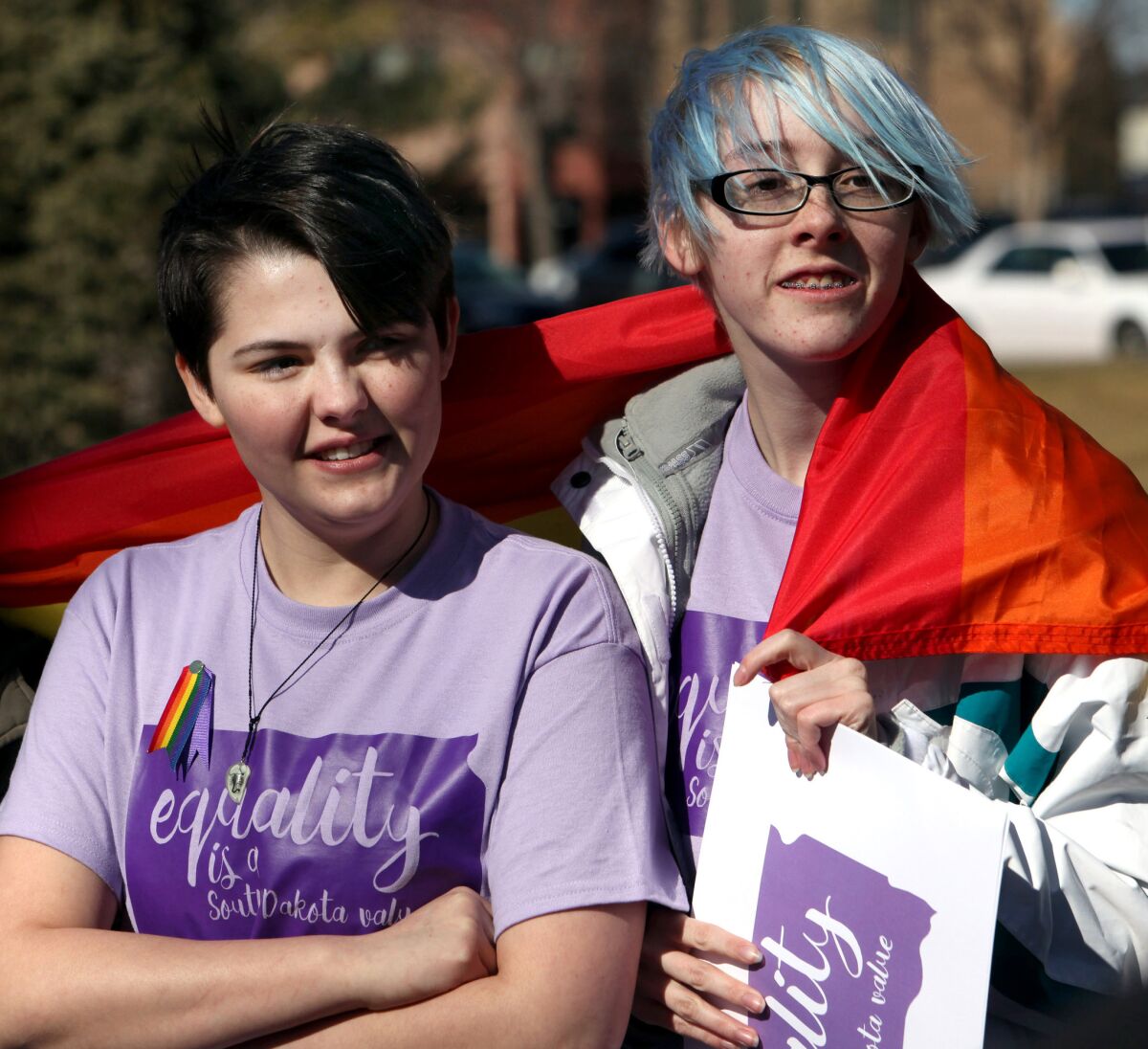 Nathan Leonard, left, a transgender high school student from Watertown, S.D., and Scout Brown, also from Watertown, stand outside of the South Dakota State Capitol in Pierre on Feb. 23.