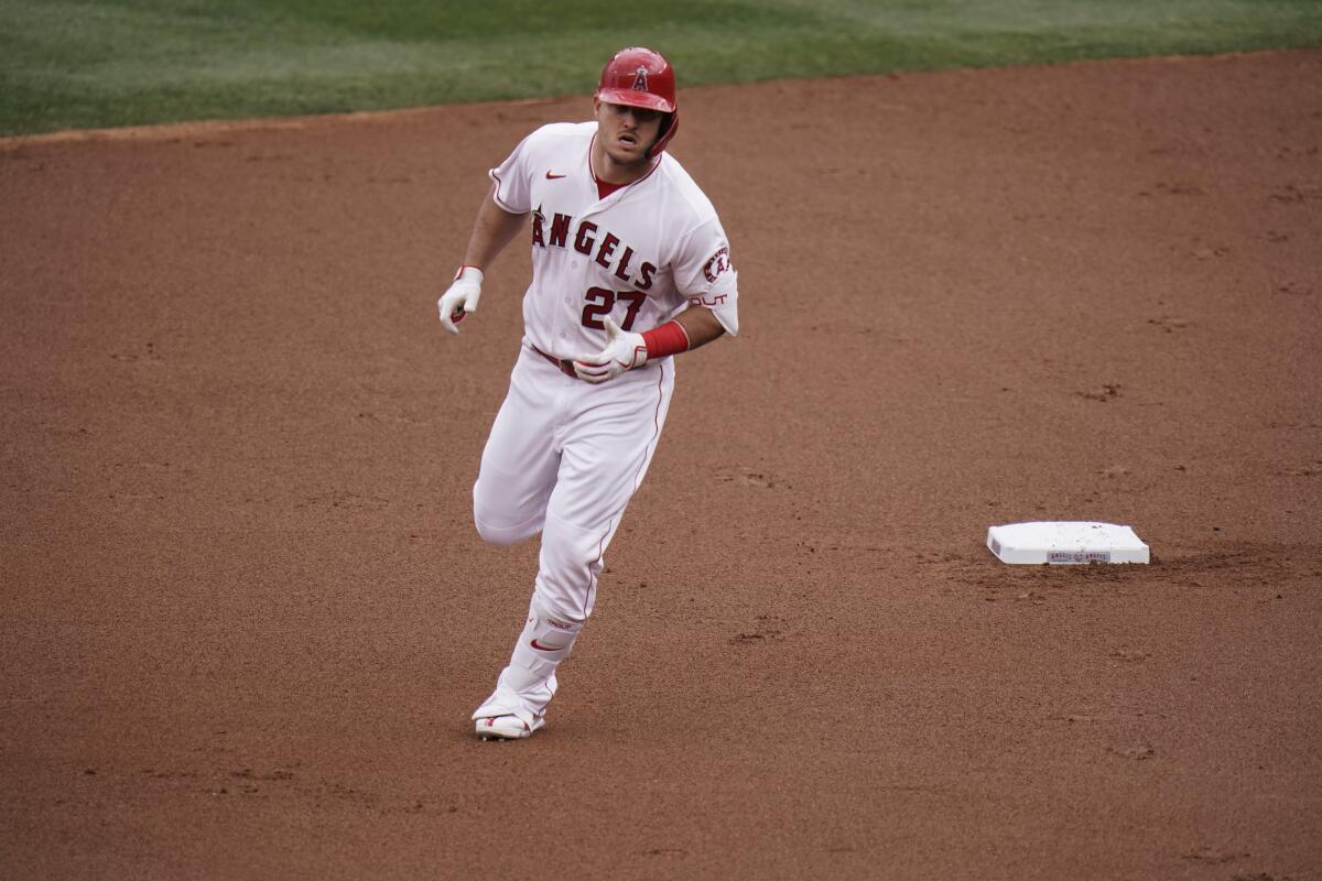 The Angels' Mike Trout rounds the bases after hitting a home run April 21, 2021.