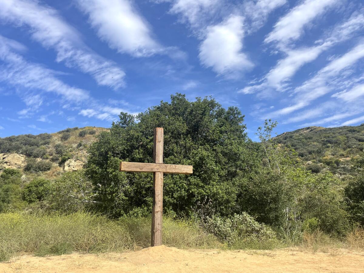 A view of the 14-foot wooden cross at the Santiago Retreat Center before it was cut down.
