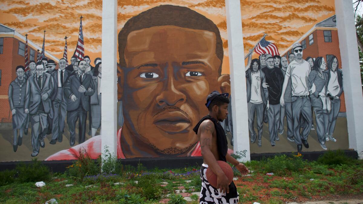 A mural in Baltimore depicts Freddie Gray, who died while in police custody.