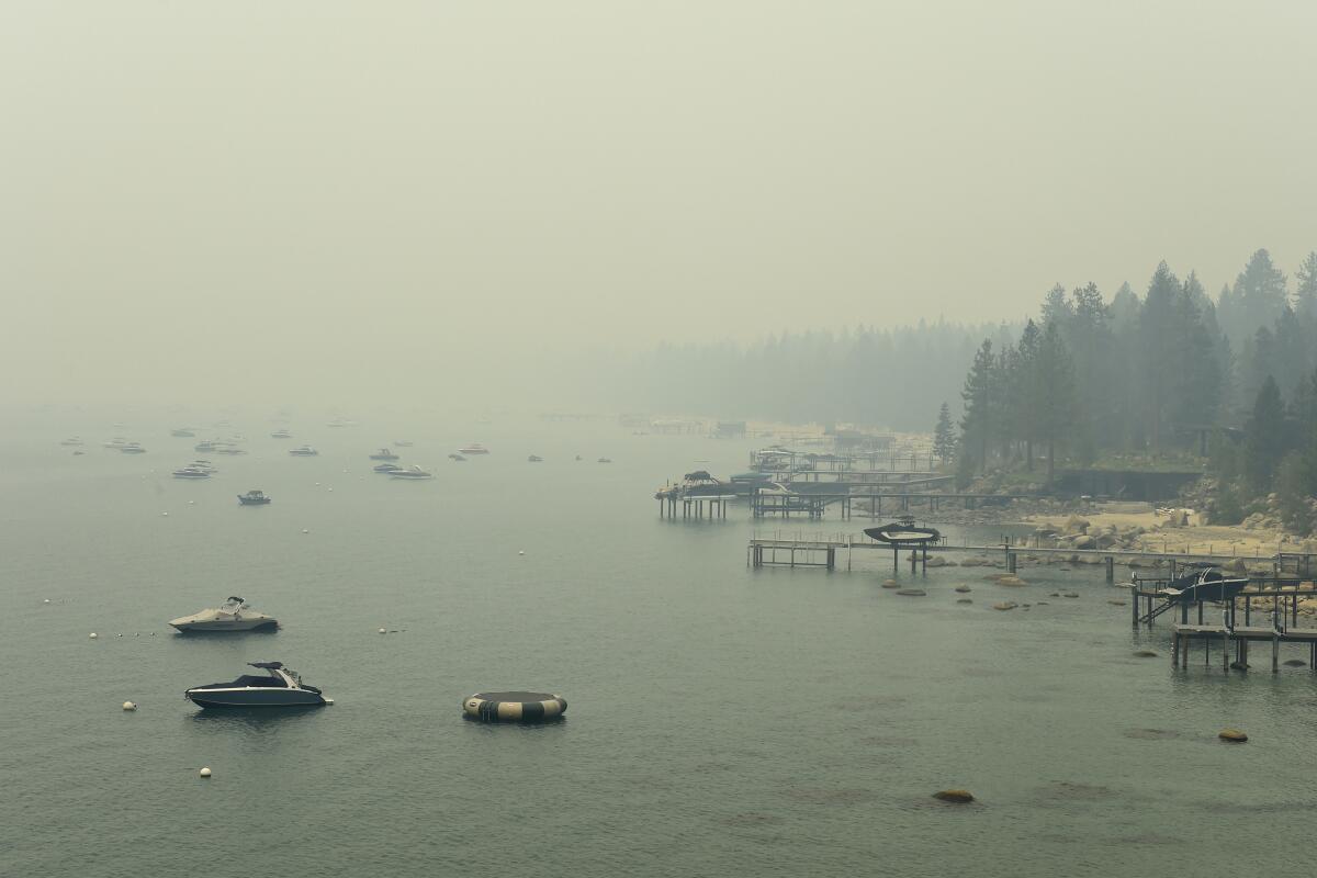 Smoke from the Caldor fire covers Lake Tahoe.