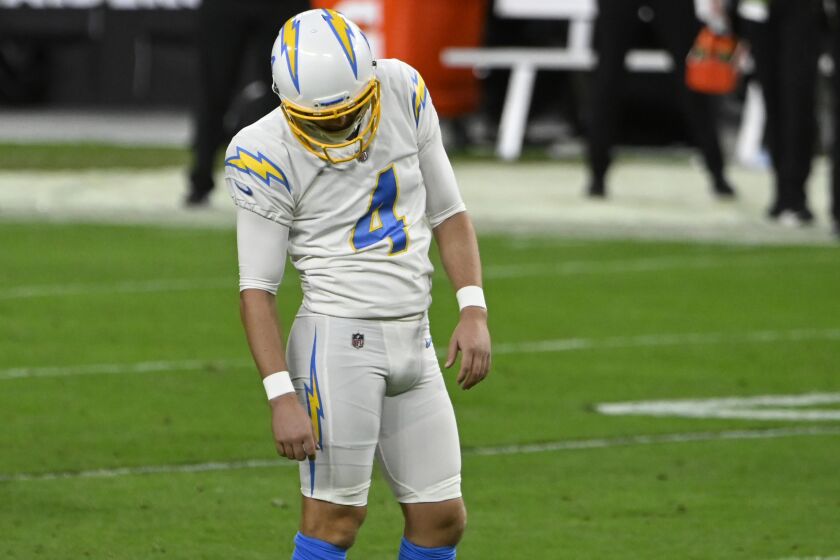 Los Angeles Chargers kicker Mike Badgley (4) reacts after missing a field goal attempt against the Las Vegas Raiders during the second half of an NFL football game, Thursday, Dec. 17, 2020, in Las Vegas. (AP Photo/David Becker)